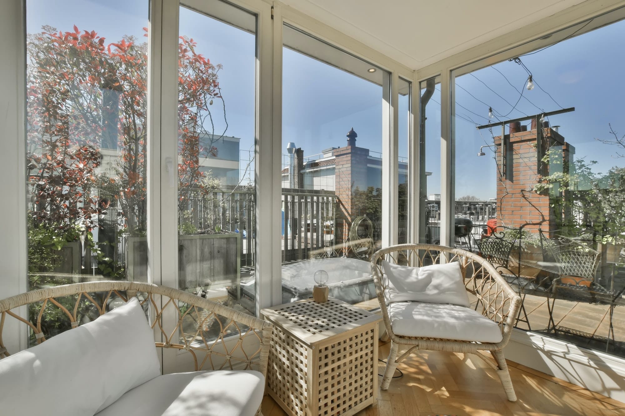 Cozy covered veranda with panoramic windows